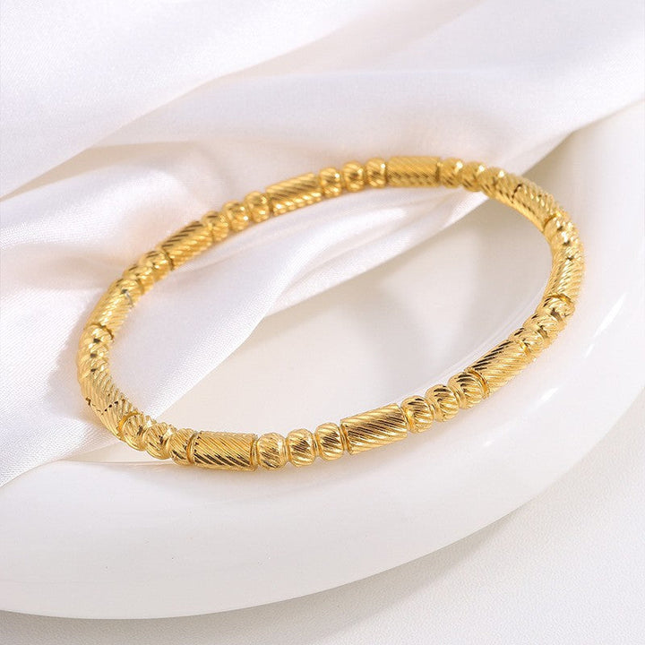 Alluring Gold Twisted Bracelet